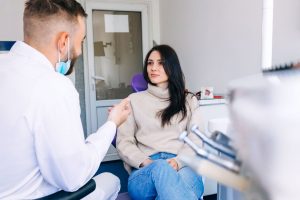 Patient having consult at The Denture Clinic Canberra