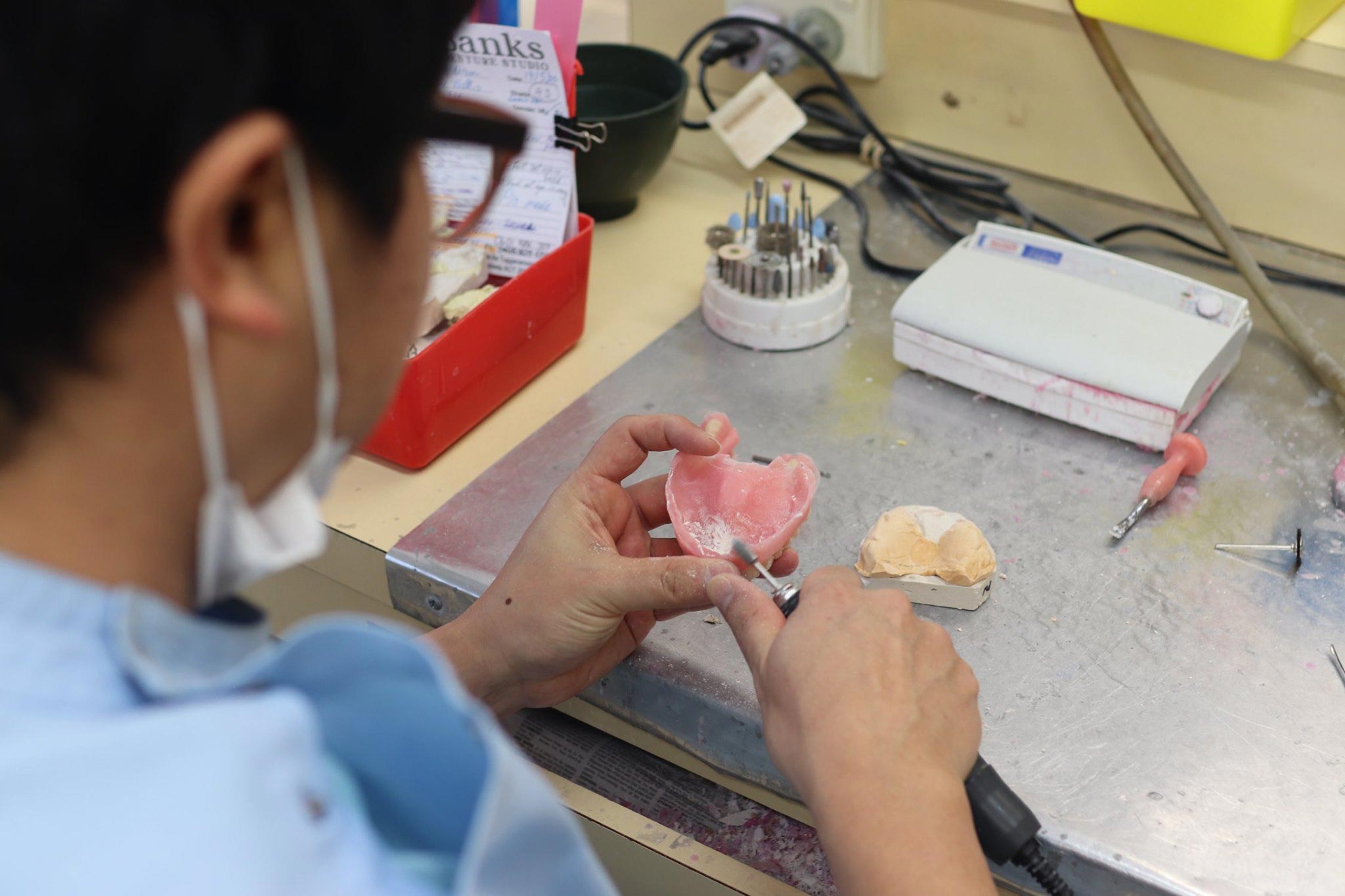 Technician Working On Dentures